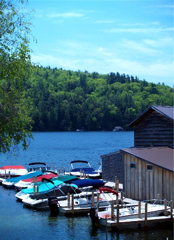 It's officially summer in New Hampshire. We caught this boathouse on Squam Lake on Memorial Day Weekend.