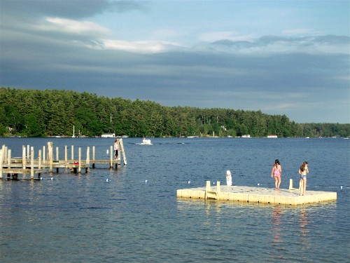 The town docks and diving platform at the public beach in Center Harbor, NH.